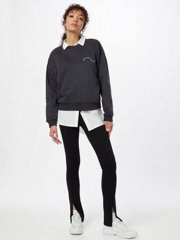 Sweat-shirt 'BE GOOD DO GOOD' Comfort Studio by Catwalk Junkie en noir