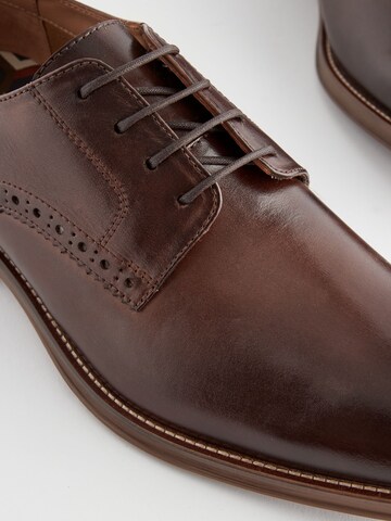 Next Veterschoen in Bruin
