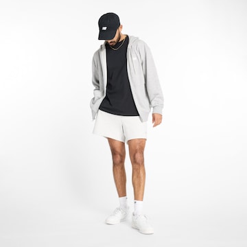 Loosefit Pantaloni 'Athletics French Terry Short 5"' di new balance in bianco