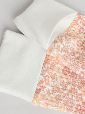 Tutina / body per bambino di Next in beige