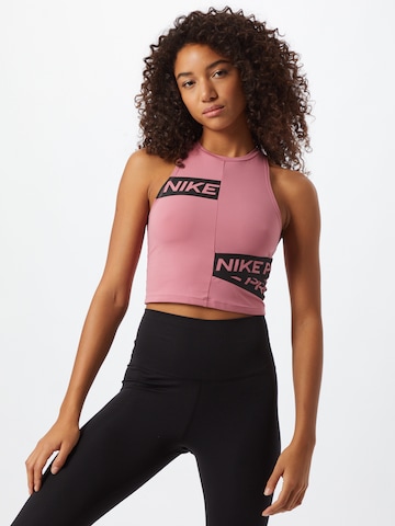 NIKE Sports Top 'Trompe' in Pink: front