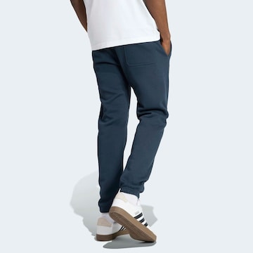 ADIDAS SPORTSWEAR Tapered Workout Pants in Blue