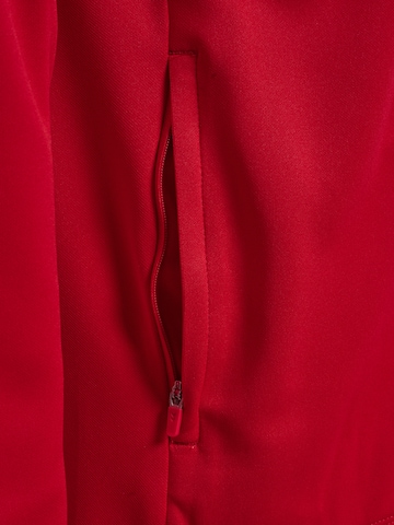 Veste de survêtement 'Core 2.0' Hummel en blanc
