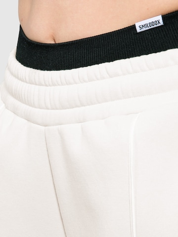 Loosefit Pantalon Smilodox en beige