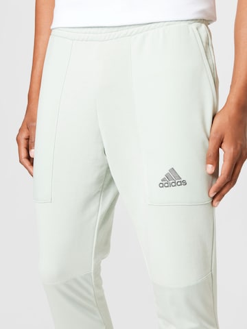 ADIDAS SPORTSWEAR Slimfit Sportnadrágok 'Essentials Brandlove French Terry' - zöld