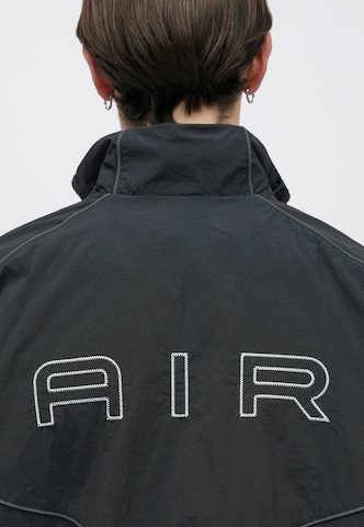 Nike Sportswear Overgangsjakke 'AIR' i sort