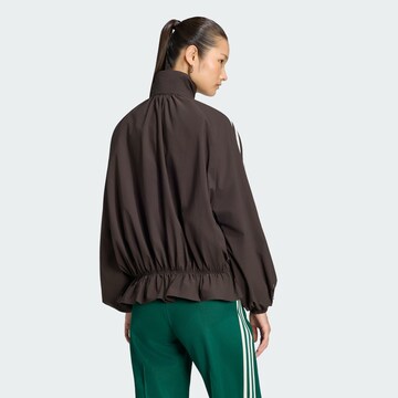 ADIDAS ORIGINALS - Chaqueta de entretiempo en marrón
