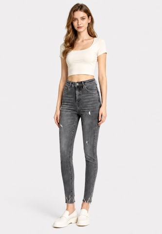 Skinny Jeans di Elara in grigio