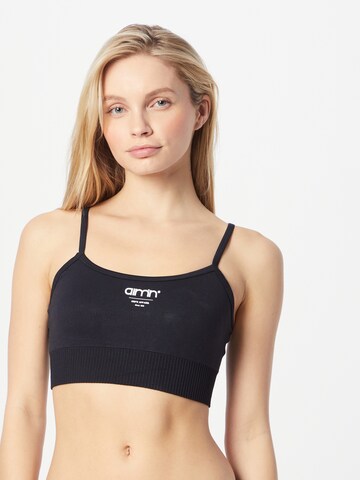 aim'n Bralette Sports Bra in Black: front