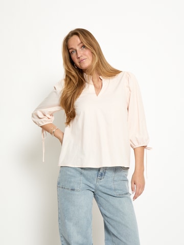 Peppercorn - Top 'Naima' en naranja: frente