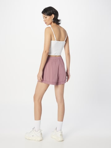 ABOUT YOU Loose fit Trousers 'Dorina' in Pink