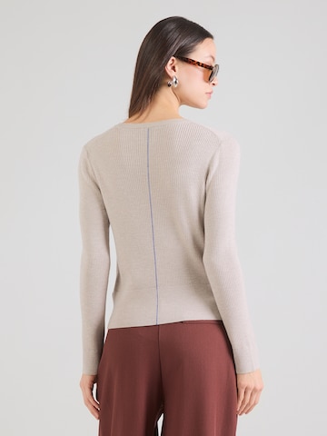 Calvin Klein Πλεκτή ζακέτα σε καφέ: πίσω