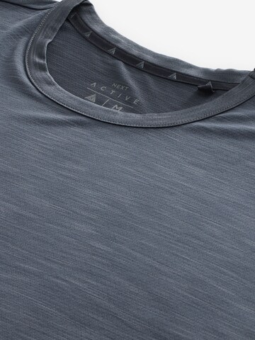T-Shirt Next en gris