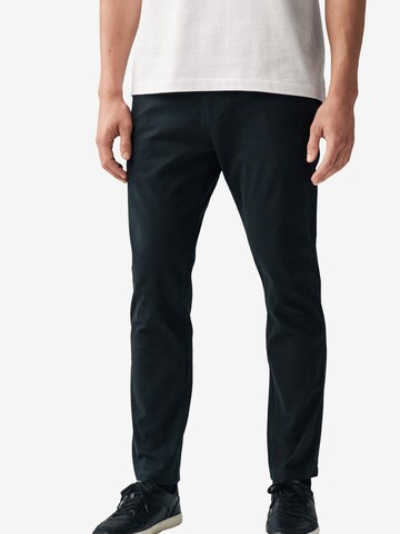Slimfit Pantaloni chino di Next in nero: frontale