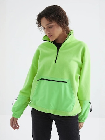 Sweat-shirt Tommy Life en vert