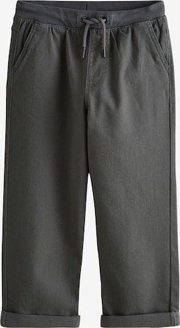 pilka Next Plačios klešnės Kelnės: priekis