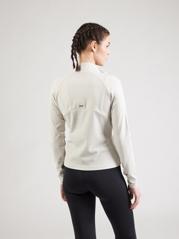 Veste en polaire fonctionnelle 'Aliya' Athlecia en gris