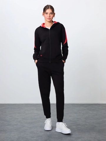 Tommy Life Aktive Sets in Schwarz: Vorderseite