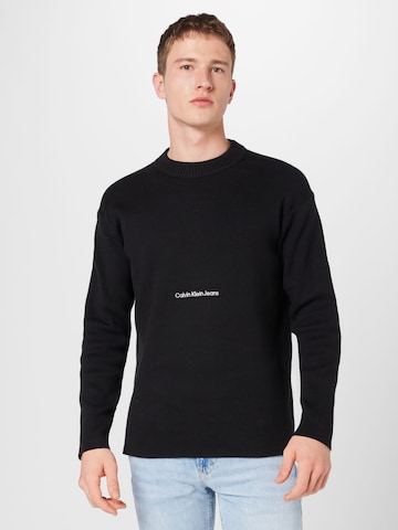 Pull-over Calvin Klein Jeans en noir : devant