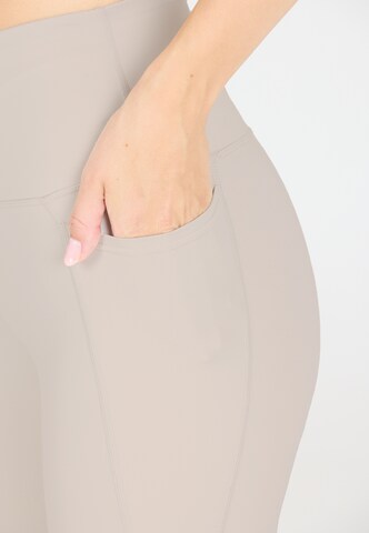 Athlecia Skinny Sports trousers 'Aliya' in Beige