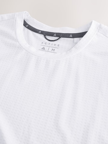 Next Paita värissä valkoinen