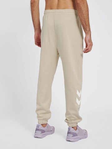 Effilé Pantalon de sport Hummel en gris