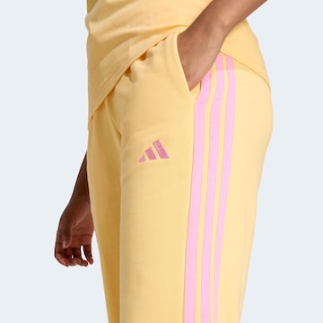 ADIDAS SPORTSWEAR Tapered Sporthose 'Essentials' in Gelb