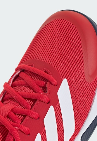 Chaussure de sport 'Ubersonic' ADIDAS PERFORMANCE en rouge