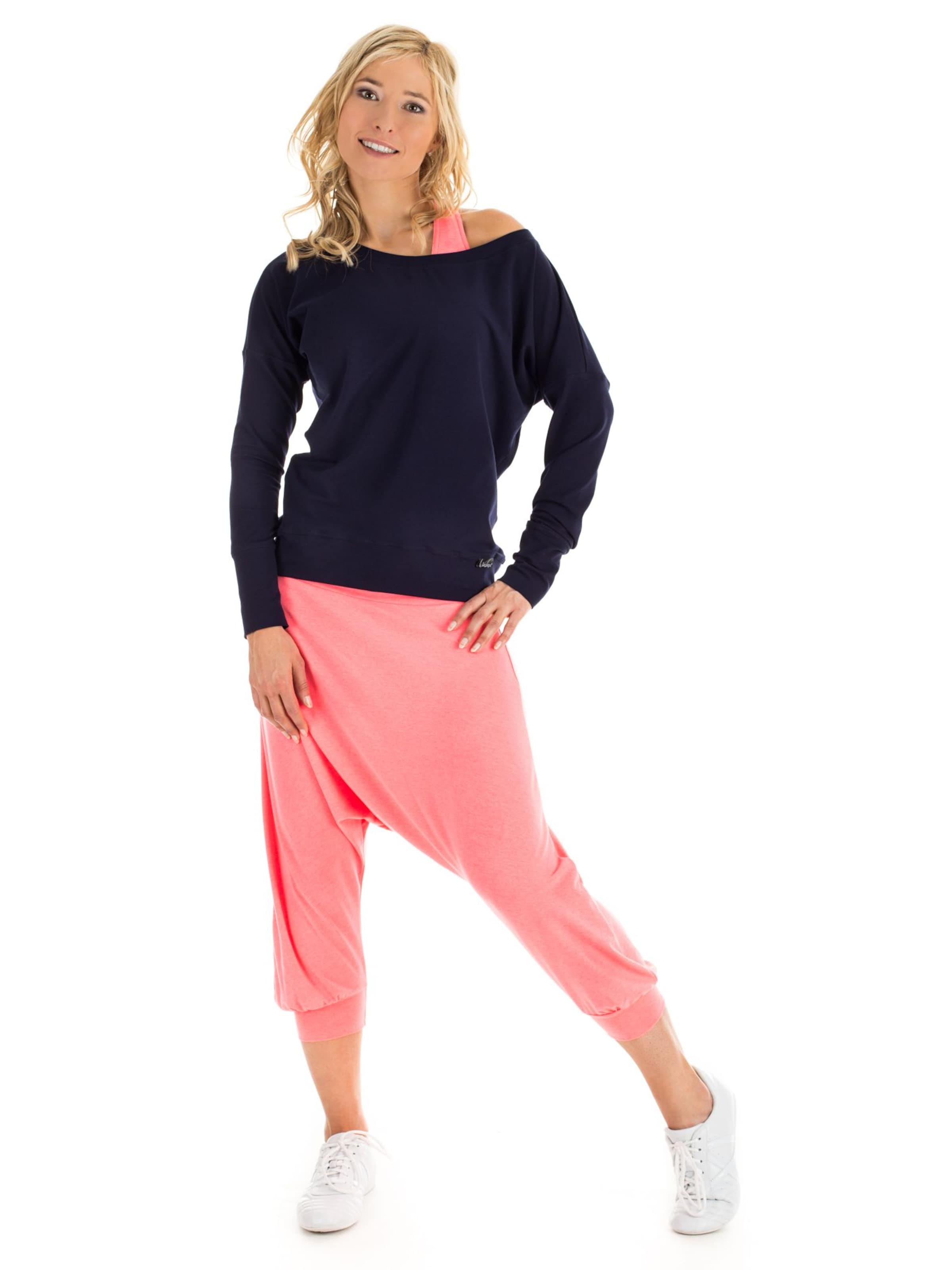 Winshape Õlapaelteta topp Spordirinnahoidja 'WVR1', värv oranž