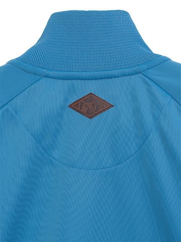 Vestes d’entraînement 'Dmwu' Unfair Athletics en bleu