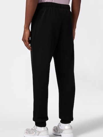 Champion Authentic Athletic Apparel Zwężany krój Spodnie w kolorze czarny