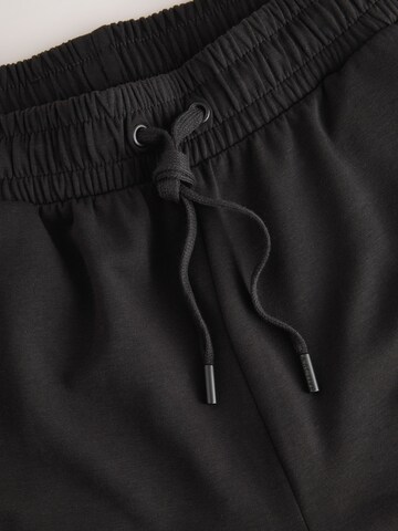 Barrel Pantalon de sport Next en noir