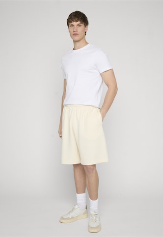 Regular Pantalon Karl Kani en beige