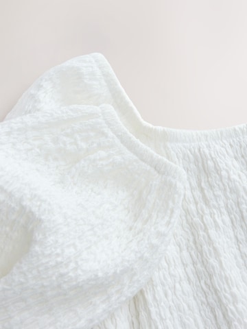 Next - Camiseta en blanco