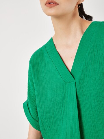Chemisier Apricot en vert