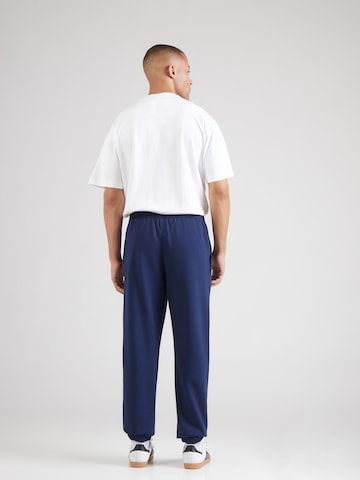 ADIDAS ORIGINALS Tapered Παντελόνι 'ESS' σε μπλε