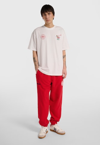 T-Shirt fonctionnel Hummel en blanc