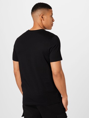 PUMA T-Shirt in Schwarz