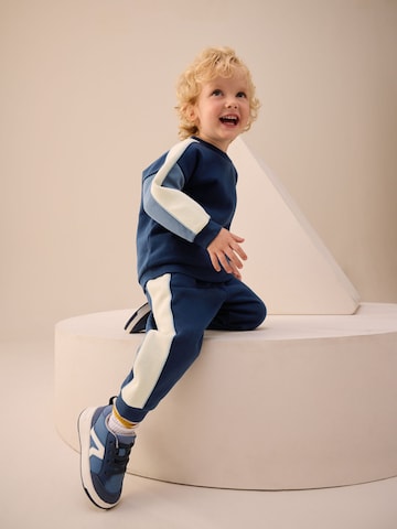 Next - Ropa para correr en azul