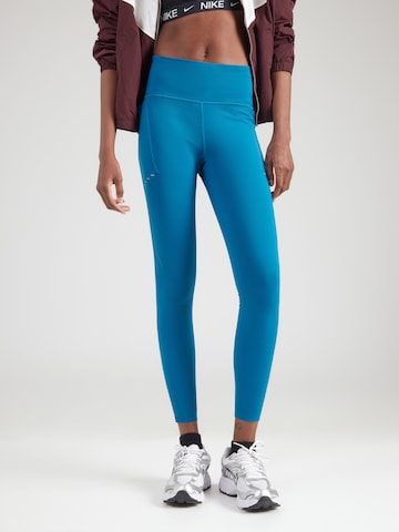 NIKE Kitsas Spordipüksid 'SWIFT', värv sinine: eest vaates