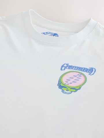T-Shirt Next en blanc