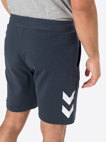 Regular Pantaloni sport 'Legacy' de la Hummel pe albastru