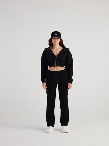 HOLLY LOLLY Regular Trousers in Black