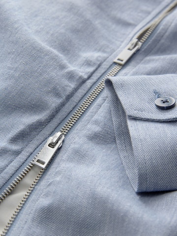 Next Tussenjas in Blauw