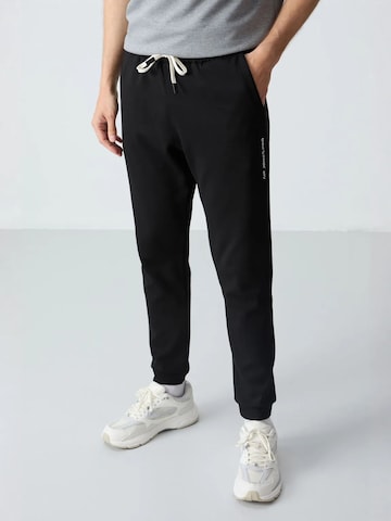 Tommy Life Jogginganzug in Grau