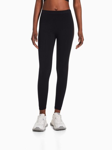 Bershka Slim fit Leggings in Black: front