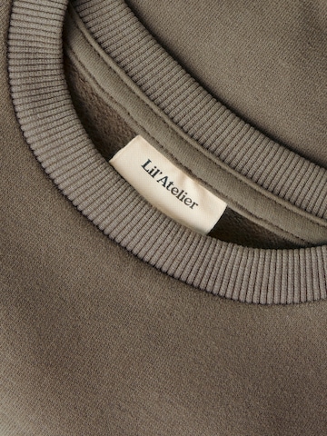 Lil'Atelier - Sweatshirt 'NMNILONDON' em castanho