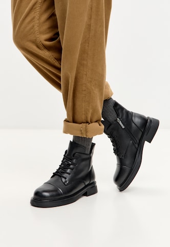 CESARE GASPARI Lace-up bootie in Black