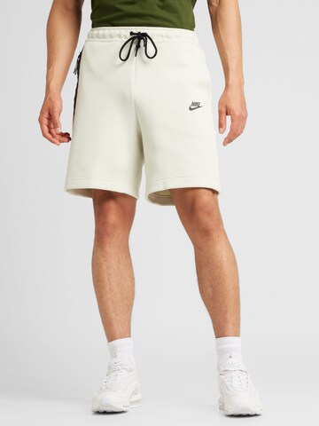 Nike Sportswear Широка кройка Панталон в сиво: отпред