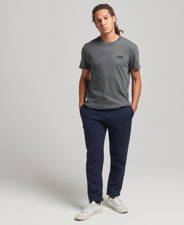 Superdry Tapered Broek in Blauw